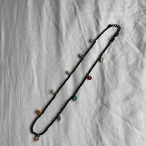 Black beaded flower necklace with